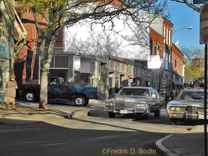 Here's a view of today's shoot at the corner of Main and Center Streets. From what I could glean, the filming was mostly drive-by's with 70's and 80's cars, all with Maine plates. They'll be working here tomorrow and the day after. Interesting for me, but not much business.