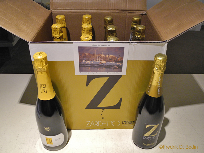 This afternoon, my first day in the gallery since New Year's Eve, Bob Morgan of Savour Wine and Cheese, came in with a present for the gallery. He and Kathleen Erickson wanted to thank me for helping them. These 12 bottles of Prosecco will be used for our next gallery event. January Chocolate Tour? Valentine's Party? Or big GMG Mug Up? As I learned from Joey C., don't solicit contributions. But if they are forthcoming, I'll share them with all of my friends from Good Morning Gloucester.